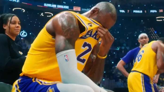 LeBron James wipes away tears during tribute